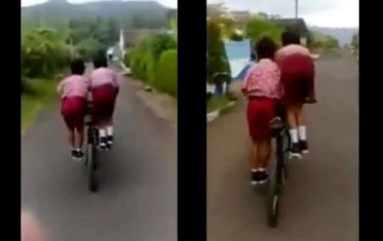 Kayuh sepeda berdua video kekompakan dan keseimbangan dua siswa ini bikin salut